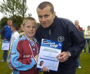 24 June 2006; Jason Abbott, Springfield Ramblers captain, is presented with a team certificate by Republic of Ireland goalkeeper Shay Given after the Danone Nations Cup. AUL Complex, Clonshaugh, Dublin. Picture credit: Pat Murphy / SPORTSFILE