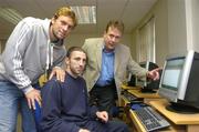 26 June 2006; Shelbourne players Jamie Harris, left, and Owen Heary, are instructed by 'ideas Institute' instructor Kevin O'Neill, right, at the launch of the PFAI computer training programme for eircom league players. The programme is run by the PFAI in conjuction with 'ideas Institute', a non profit educational organisation. SIPTU College, Kilmainham, Dublin. Picture credit: Pat Murphy / SPORTSFILE