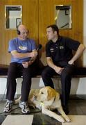 27 June 2006; Tipperary hurler Eoin Kelly is interviewed by Eugene Crotty, Youghal local radio with his guide dog Ross. Eoin was awarded the Opel Gaelic Player of the Month Award in hurling for May, in conjunction with the Gaelic Players Association. Fitzwilliam Hotel, Dublin. Picture credit: Damien Eagers / SPORTSFILE