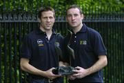 27 June 2006; Offaly footballer Karol Slattery, left, and Tipperary hurler Eoin Kelly who were presented with the Opel Gaelic Player of the Month Awards for May, in conjunction with the Gaelic Players Association. St Stephen's Green, Dublin. Picture credit: Damien Eagers / SPORTSFILE