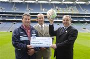 29 June 2006; Gaelic Telecom, the Official Telecoms Partner of the GAA, today presented a total of 20,000 Euro to Westport GAA and 2 members of the club. Pictured at the presentation are, President of the GAA, Nickey Brennan with John Coghlan, Chairman of Westport GAA and Gerry O'Connell, centre, general manager Gaelic Telecom. Croke Park, Jones Road, Dublin. Picture credit: Damien Eagers / SPORTSFILE