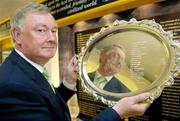 29 June 2006; John O'Donoghue,T.D, Minister for Arts, Sport and Tourism, who today opened the prestigious World Golf Hall of Fame exhibit at Waterford Crystal, the official sponsor of the 2006 Ryder Cup, holds the specially commissioned silver plaque which was presented to Bernhard Langer on his success in leading the European team to victory during the 2004 Ryder Cup. Waterford Crystal Visitor Centre, Waterford Crystal, Waterford. Picture credit: Brian Lawless / SPORTSFILE