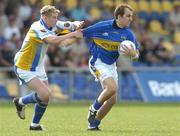 1 July 2006; Cian Maher, Tipperary, in action against Paddy Dowd, Longford. Bank of Ireland All-Ireland Senior Football Championship Qualifier, Round 2, Longford v Tipperary, Pearse Park, Longford. Picture credit: Pat Murphy / SPORTSFILE