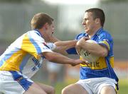 1 July 2006; Declan Browne, Tipperary, in action against Noel Farrell, Longford. Bank of Ireland All-Ireland Senior Football Championship Qualifier, Round 2, Longford v Tipperary, Pearse Park, Longford. Picture credit: Pat Murphy / SPORTSFILE