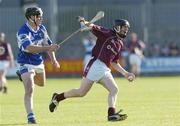 1 July 2006; Daniel Carty, Westmeath, in action against Pakie Cuddy, Laois. Guinness All-Ireland Senior Hurling Championship Qualifier, Round 2, Westmeath v Laois, Cusack Park, Mullingar, Co. Westmeath. Picture credit: Damien Eagers / SPORTSFILE