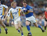 1 July 2006; Damien O'Brien, Tipperary, in action against Noel Farrell, Longford. Bank of Ireland All-Ireland Senior Football Championship Qualifier, Round 2, Longford v Tipperary, Pearse Park, Longford. Picture credit: Pat Murphy / SPORTSFILE