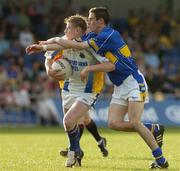 1 July 2006; Paddy Dowd, Longford, in action against Robbie Costigan, Tipperary. Bank of Ireland All-Ireland Senior Football Championship Qualifier, Round 2, Longford v Tipperary, Pearse Park, Longford. Picture credit: Pat Murphy / SPORTSFILE