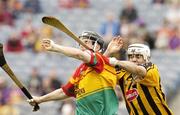 2 July 2006; Cathal Coughlan, Carlow, in action against Ger Fennelly, Kilkenny. ESB Leinster Minor Hurling Championship Final, Carlow v Kilkenny, Croke Park, Dublin. Picture credit: Pat Murphy / SPORTSFILE