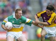 2 July 2006; Neville Coughlan, Offaly, in action against Ciaran Deely, Wexford. Bank of Ireland Leinster Senior Football Championship Semi-Final, Offaly v Wexford, Croke Park, Dublin. Picture credit: David Maher / SPORTSFILE