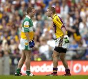 2 July 2006; Matty Forde, Wexford, confronts Offaly's Shane Sullivan during the final stages of the game. Bank of Ireland Leinster Senior Football Championship Semi-Final, Offaly v Wexford, Croke Park, Dublin. Picture credit: Pat Murphy / SPORTSFILE