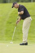 5 July 2006; Tom Lehman watches his putt on the 6th green during the Kappa Smurfit European Open Golf Championship Pro-Am. K Club, Straffan, Co. Kildare. Picture credit: Matt Browne / SPORTSFILE