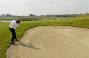 5 July 2006; Padraig Harrington, plays from the bunker onto the 10th fairway during the Kappa Smurfit European Open Golf Championship Pro-Am. K Club, Straffan, Co. Kildare. Picture credit: Matt Browne / SPORTSFILE