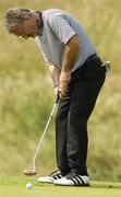 5 July 2006; Eddie Jordan putts on the 10th green during the Kappa Smurfit European Open Golf Championship Pro-Am. K Club, Straffan, Co. Kildare. Picture credit: Matt Browne / SPORTSFILE