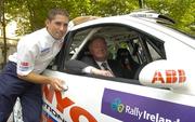 5 July 2006; John O'Donoghue T.D., Minister for Arts, Sport and Tourism, with Gareth McHale, Irelands only world rally driver, at the announcement that Rally Ireland is to stage the first ever stage of the World Rally Championship to be held in Ireland in November 2007. Dail Eireann, Dublin. Picture credit: Pat Murphy / SPORTSFILE