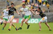 22 June 2014; Patrick McBrearty, Donegal, in action against Niall McKeever and Paul McCann, Antrim. Ulster GAA Football Senior Championship, Semi-Final, Donegal v Antrim, St Tiernach's Park, Clones, Co. Monaghan. Picture credit: Oliver McVeigh / SPORTSFILE