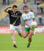 22 June 2014; Frank McGlynn, Donegal, in action against Paul McCann, Antrim. Ulster GAA Football Senior Championship, Semi-Final, Donegal v Antrim, St Tiernach's Park, Clones, Co. Monaghan. Picture credit: Oliver McVeigh / SPORTSFILE