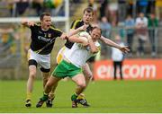22 June 2014; Colm McFadden, Donegal, in action against Michael McCann, left, and Justin Crozier, Antrim. Ulster GAA Football Senior Championship, Semi-Final, Donegal v Antrim, St Tiernach's Park, Clones, Co. Monaghan. Picture credit: Oliver McVeigh / SPORTSFILE