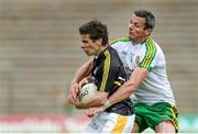 22 June 2014; Kevin O'Boyle, Antrim, in action against Christy Toye, Donegal. Ulster GAA Football Senior Championship, Semi-Final, Donegal v Antrim, St Tiernach's Park, Clones, Co. Monaghan. Picture credit: Oliver McVeigh / SPORTSFILE