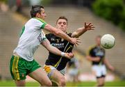22 June 2014; Christy Toye, Donegal, in action against Mark Sweeney, Antrim. Ulster GAA Football Senior Championship, Semi-Final, Donegal v Antrim, St Tiernach's Park, Clones, Co. Monaghan. Picture credit: Oliver McVeigh / SPORTSFILE