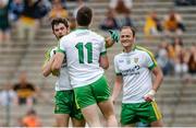 22 June 2014; Leo McLoone, Donegal, centre, celebrates with team-mates Ryan McHugh, left, and Colm McFadden, after scoring his sides first goal. Ulster GAA Football Senior Championship, Semi-Final, Donegal v Antrim, St Tiernach's Park, Clones, Co. Monaghan. Picture credit: Oliver McVeigh / SPORTSFILE