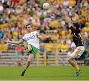 22 June 2014; Christy Toye, Donegal, in action against Kevin O'Boyle, Antrim. Ulster GAA Football Senior Championship, Semi-Final, Donegal v Antrim, St Tiernach's Park, Clones, Co. Monaghan. Picture credit: Oliver McVeigh / SPORTSFILE