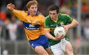 22 June 2014; Paul Murphy, Kerry, in action against Padraic Collins, Clare. Munster GAA Football Senior Championship, Semi-Final, Clare v Kerry, Cusack Park, Ennis, Co. Clare. Picture credit: Ray McManus / SPORTSFILE