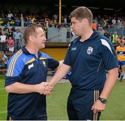 22 June 2014; The Clare manager, Colm Collins, left, and Kerry manager, Eamonn Fitzmaurice, shake hands after the game. Munster GAA Football Senior Championship, Semi-Final, Clare v Kerry, Cusack Park, Ennis, Co. Clare. Picture credit: Ray McManus / SPORTSFILE