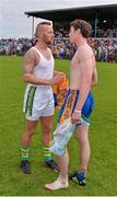 22 June 2014; Clare full back Kevin Hartnett, right, and Barry John Keane, Kerry, after the game. Munster GAA Football Senior Championship, Semi-Final, Clare v Kerry, Cusack Park, Ennis, Co. Clare. Picture credit: Ray McManus / SPORTSFILE