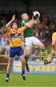 22 June 2014; Kieran Donaghy, Kerry, in action against Shane McNeils, Clare. Munster GAA Football Senior Championship, Semi-Final, Clare v Kerry, Cusack Park, Ennis, Co. Clare. Picture credit: Ray McManus / SPORTSFILE