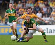 22 June 2014; Kieran Donaghy, Kerry, in action against Shane McNeils, Clare. Munster GAA Football Senior Championship, Semi-Final, Clare v Kerry, Cusack Park, Ennis, Co. Clare. Picture credit: Ray McManus / SPORTSFILE