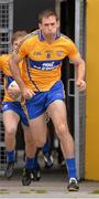 22 June 2014; Clare captain Gary Brennan leads out the team. Munster GAA Football Senior Championship, Semi-Final, Clare v Kerry, Cusack Park, Ennis, Co. Clare. Picture credit: Ray McManus / SPORTSFILE
