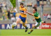 22 June 2014; Gary Brennan, Clare, in action against Declan O'Sullivan, Kerry. Munster GAA Football Senior Championship, Semi-Final, Clare v Kerry, Cusack Park, Ennis, Co. Clare. Picture credit: Ray McManus / SPORTSFILE