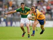 22 June 2014; Martin O'Leary, Clare, in action against Shane Enright, Kerry. Munster GAA Football Senior Championship, Semi-Final, Clare v Kerry, Cusack Park, Ennis, Co. Clare. Picture credit: Ray McManus / SPORTSFILE
