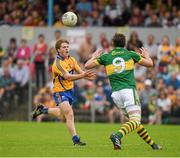 22 June 2014; Padraic Collins, Clare, in action against David Moran, Kerry. Munster GAA Football Senior Championship, Semi-Final, Clare v Kerry, Cusack Park, Ennis, Co. Clare. Picture credit: Ray McManus / SPORTSFILE