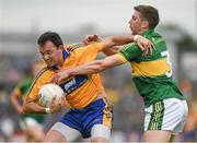 22 June 2014; David Tubridy, Clare, in action against Marc Ó Sé, Kerry. Munster GAA Football Senior Championship, Semi-Final, Clare v Kerry, Cusack Park, Ennis, Co. Clare. Picture credit: Ray McManus / SPORTSFILE