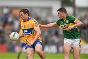 22 June 2014; Gary Brennan, Clare, in action against Michael Geaney, Kerry. Munster GAA Football Senior Championship, Semi-Final, Clare v Kerry, Cusack Park, Ennis, Co. Clare. Picture credit: Ray McManus / SPORTSFILE