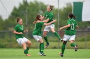 25 June 2014; Republic of Ireland's Megan Connolly, 9, celebrates with team-mate, from left to right, Ciara Rossiter, Lauren Dwyer and Katie McCabe, after scoring her side's first goal. Women's U19 International Friendly, Republic of Ireland v Norway, AUL Complex, Clonshaugh, Dublin. Picture credit: Stephen McCarthy / SPORTSFILE