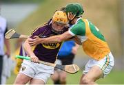25 June 2014; Rhys Clarke, Wexford, in action against Stephen Connolly, Offaly. Bord Gáis Energy Leinster GAA Hurling Under 21 Championship, Semi-Final, Wexford v Offaly, Wexford Park, Wexford. Picture credit: Matt Browne / SPORTSFILE
