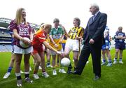 3 July 2006; An Taoiseach, Bertie Ahern TD, with representatives from competing counties, from left, Maria Mulligan, Westmeath, Andrea Murphy, Louth, Emma Henry, Offaly and April Purcell, Kilkenny, at the launch of the 2006 TG4 All-Ireland Ladies Football Championship. Croke Park, Dublin. Picture credit: Brendan Moran / SPORTSFILE