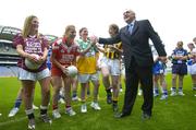 3 July 2006; An Taoiseach, Bertie Ahern TD, with representatives from competing counties, from left, Maria Mulligan, Westmeath, Andrea Murphy, Louth, Emma Henry, Offaly and April Purcell, Kilkenny, at the launch of the 2006 TG4 All-Ireland Ladies Football Championship. Croke Park, Dublin. Picture credit: Brendan Moran / SPORTSFILE