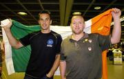 5 July 2006; Cavan's Paul Brady, left, and Michael Finnegan, who won gold in the doubles event at the World Handball finals in California, USA, on their arrival home to Dublin Airport, Dublin. Picture credit: Pat Murphy / SPORTSFILE