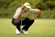 7 July 2006; Retief Goosen lines up a putt on the 9th green during the 2nd round of the Kappa Smurfit European Open Golf Championship. K Club, Straffan, Co. Kildare. Picture credit: Damien Eagers / SPORTSFILE