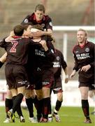 7 July 2006; Player-manager Gareth Farrelly, Bohemians, with head bandage, is congratulated by team-mates after scoring his side's first goal. eircom League, Premier Division, Bohemians v Derry City, Dalymount Park, Dublin. Picture credit: Brian Lawless / SPORTSFILE