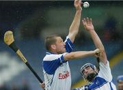 8 July 2006; Ken McGrath, Waterford, contests a dropping ball with Joe Phelan, Laois. Guinness All-Ireland Senior Hurling Championship Qualifier, Round 3, Laois v Waterford, O'Moore Park, Portlaoise, Co. Laois. Picture credit: Brendan Moran / SPORTSFILE