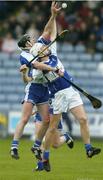 8 July 2006; Tony Browne, Waterford, and Tommy Fitzgerald, Laois, contest a dropping ball. Guinness All-Ireland Senior Hurling Championship Qualifier, Round 3, Laois v Waterford, O'Moore Park, Portlaoise, Co. Laois. Picture credit: Brendan Moran / SPORTSFILE