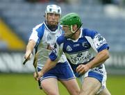 8 July 2006; Damien Culleton, Laois, gets past James Murray, Waterford, on his way to scoring his side's first goal. Guinness All-Ireland Senior Hurling Championship Qualifier, Round 3, Laois v Waterford, O'Moore Park, Portlaoise, Co. Laois. Picture credit: Brendan Moran / SPORTSFILE