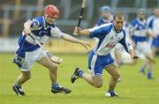 8 July 2006; Eoin McGrath, Waterford, in action against Brian Campion, Laois. Guinness All-Ireland Senior Hurling Championship Qualifier, Round 3, Laois v Waterford, O'Moore Park, Portlaoise, Co. Laois. Picture credit: Brendan Moran / SPORTSFILE
