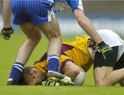 8 July 2006; Matty Forde, Wexford, is tackled by Colm Flanagan, Monaghan. Bank of Ireland All-Ireland Senior Football Championship Qualifier, Round 2, Monaghan v Wexford, St. Tighearnach's Park, Clones, Co. Monaghan. Picture credit: David Maher / SPORTSFILE