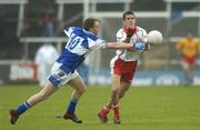 8 July 2006; Raymond Mulgrew, Tyrone, in action against Brian McCormack, Laois. Bank of Ireland All-Ireland Senior Football Championship Qualifier, Round 2, Laois v Tyrone, O'Moore Park, Portlaoise, Co. Laois. Picture credit: Brendan Moran / SPORTSFILE