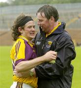 8 July 2006; Wexford manager Paul Bealin celebrates with Ciaran Deely at the end of the game. Bank of Ireland All-Ireland Senior Football Championship Qualifier, Round 2, Monaghan v Wexford, St. Tighearnach's Park, Clones, Co. Monaghan. Picture credit: David Maher / SPORTSFILE